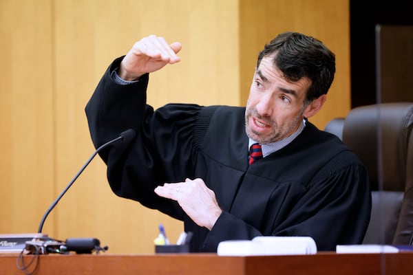 At the end of the hearing, Fulton County Superior Court Judge Robert McBurney asked both parties if he would need more time to keep investigating the special grand jury report's results and whether could be released to the public. Miguel Martinez / miguel.martinezjimenez@ajc.com