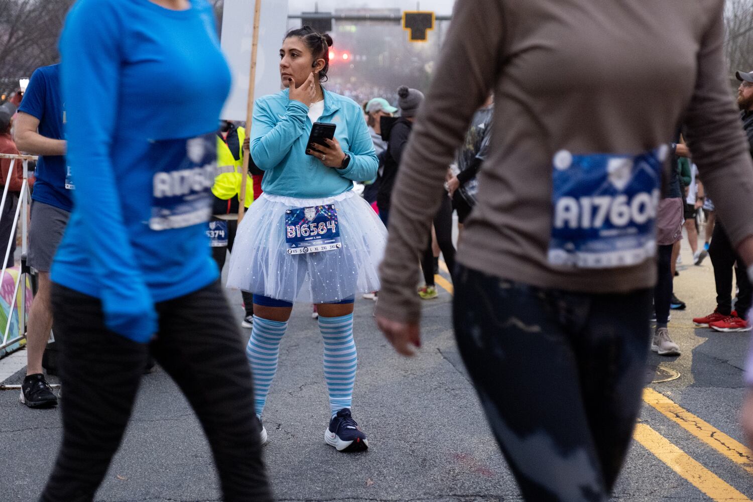 Elizabeth Castro was among the 9,000 runners participating in the Polar Opposite Peachtree Road Race on Saturday, Jan. 3, 2026, in Atlanta. (Ben Gray for the AJC)
