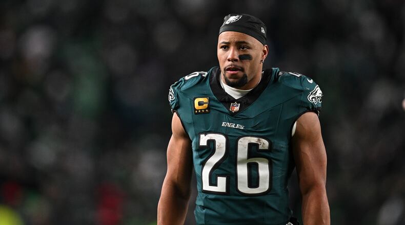 FILE - Philadelphia Eagles running back Saquon Barkley (26) walks off the field during halftime or an NFL wild card playoff football game against the San Francisco 49ers, Sunday, Jan. 11, 2026, in Philadelphia. (AP Photo/Terrance Williams, File)