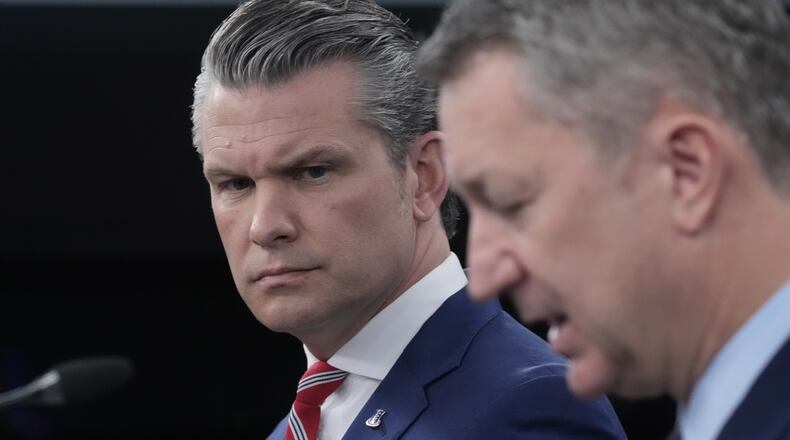 Defense Secretary Pete Hegseth and Chairman of the Joint Chiefs of Staff Gen. Dan Caine speak to members of the media during a press briefing at the Pentagon in Washington, Tuesday, May 5, 2026. (AP Photo/Manuel Balce Ceneta)