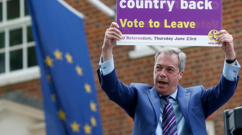 WITH STORY BRITAIN EU FUTURE - In this May 20, 2016 file photo, British politician and leader of the UKIP party Nigel Farage holds up a placard as he launches his party's campaign for Britain to leave the EU, outside the EU representative office in London. Working on how Britain might extricate itself from the EU and whether Europe would unravel in its absence is about as easy as predicting how Britons will vote on June 23, 2016. (AP Photo/Alastair Grant, File)