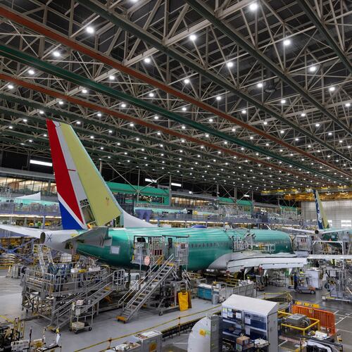 FILE - Boeing employees work on a 737 MAX airplane on the final assembly line at Boeing's plant in Renton, Wash., on June 15, 2022. (Ellen M. Banner/The Seattle Times via AP, Pool, File)