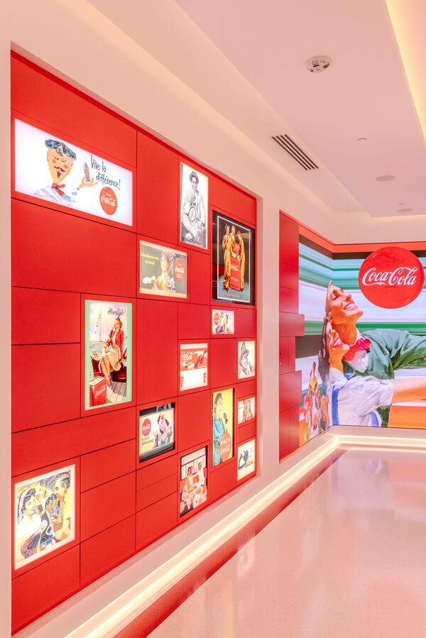 The first half of "Coca-Cola Stories" features pop-out drawers with treasures from the brand archives. Courtesy of World of Coca-Cola