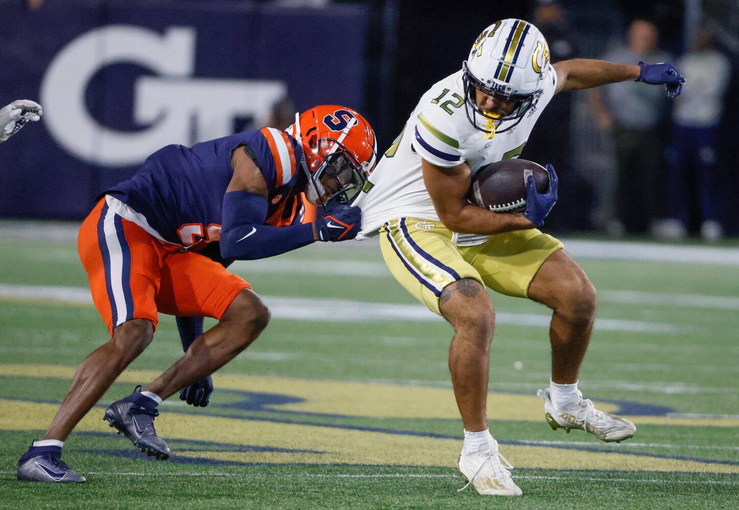 Georgia Tech Yellow Jackets quarterback Haynes King (10) makes a first down during the first half of an NCAA college football game between Georgia Tech and Syracuse in Atlanta on Saturday, Nov. 18, 2023.   (Bob Andres for the Atlanta Journal Constitution)