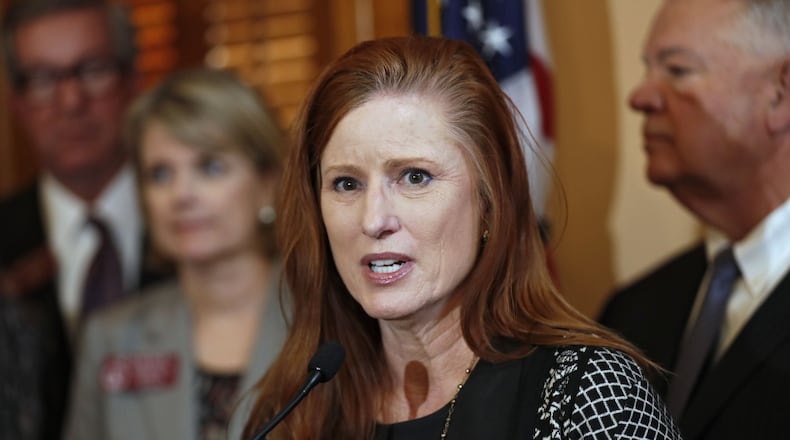 Fulton County Commissioner Liz Hausmann voted against the county’s 10.2-mill tax rate, saying residents were hurting. BOB ANDRES /BANDRES@AJC.COM AJC FILE PHOTO