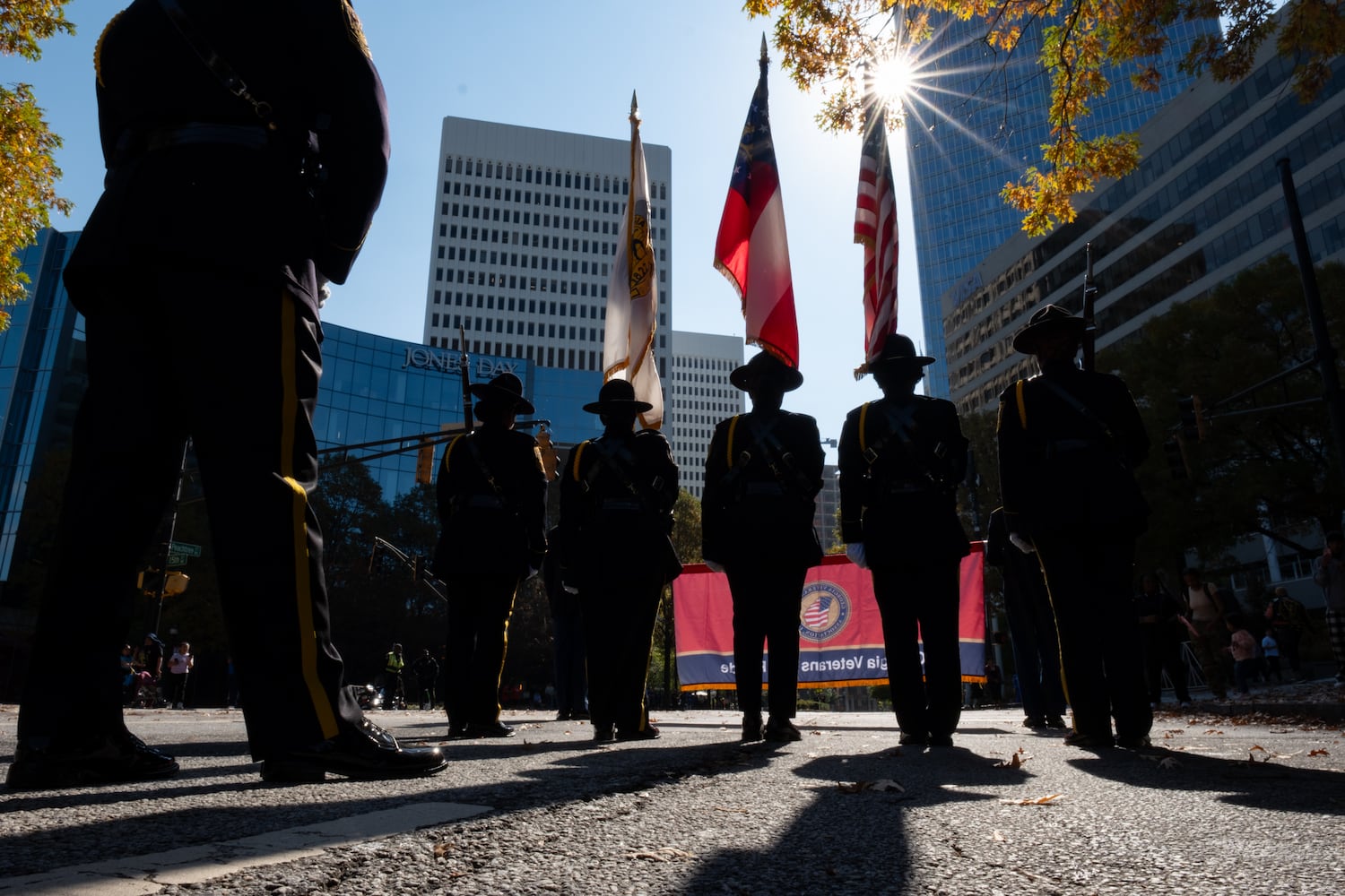 The DeKalb Police honor guard pauses on Peachtree Street while participating in the Georgia Veterans Day Parade in Midtown Atlanta on Saturday, Nov. 8, 2025.   Ben Gray for the Atlanta Journal-Constitution
