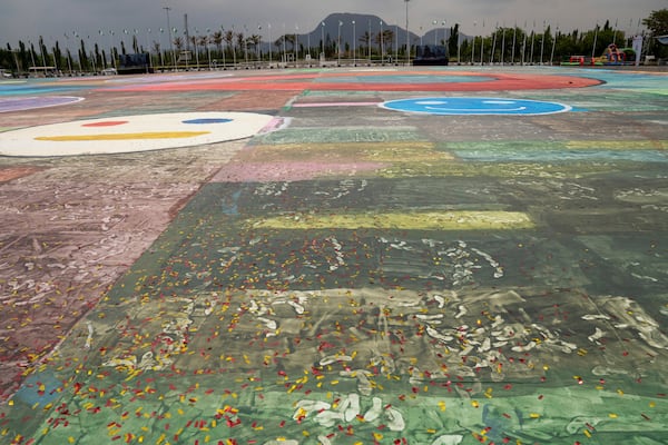 An Ariel view of the canvas painting by Kanyeyachukwu Tagbo-Okeke, a 15-year-old autistic artist who won the Guinness World Record for the largest art canvas, on display at the Eagle Square on World Autism Day in Abuja, Nigeria, Wednesday, April 2, 2025. (AP Photo/David Durowaiye)