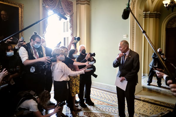 Senate Majority Leader Chuck Schumer (D-N.Y.) speaks to reporters about the infrastructure deal on Wednesday, July 28, 2021, at the Capitol in Washington. The Senate voted on Wednesday to take up a $1 trillion bipartisan infrastructure bill that would make far-reaching investments in the nation’s public works system, as Republicans joined Democrats in clearing the way for action on a crucial piece of President Joe Biden’s agenda. (T.J. Kirkpatrick/The New York Times)