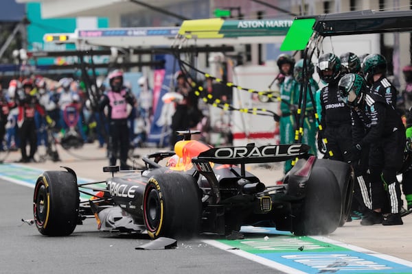 Red Bull driver Max Verstappen of the Netherlands reacts to damages during the Sprint race at the Miami Formula One Grand Prix at the International Autodrome, Saturday, May 3, 2025, in Miami Gardens, Fla. (Shawn Thew/Pool Photo via AP)