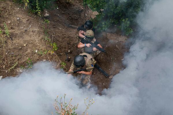 Ukrainian 3rd Assault Brigade recruits train at the polygon in Kyiv region, Ukraine, on Wednesday, July 16, 2025. (AP Photo/Evgeniy Maloletka)