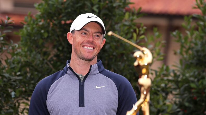 Rory McIlroy breaks out his winning smile for the first time in a year, after claiming the the Players Championship Sunday.  (Photo by Richard Heathcote/Getty Images)