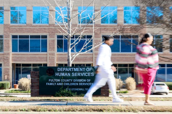 Pedestrians walk past the Department of Human Services, Division of Family & Children Services building in South Fulton, on Sunday, Nov 23, 2025. (Miguel Martinez/ AJC)