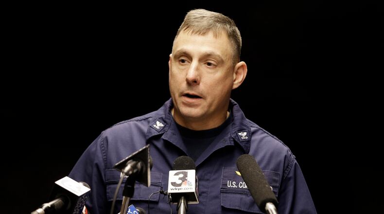Capt. Michael Mullen of the U.S. Coast Guard answers questions during a news conference at Burke Lakefront Airport, Friday, Dec. 30, 2016, in Cleveland. The U.S. Coast Guard says there's been no sign of debris or those aboard a plane that took off from the airport on the shores of Lake Erie and went missing overnight. (AP Photo/Tony Dejak)