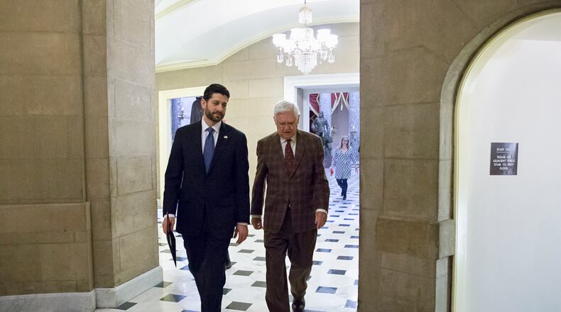 Speaker of the House Paul Ryan, R-Wis., left, and Appropriations Committee Chairman Hal Rogers, R-Ky., return to Ryan's office after passing the omnibus bill, at the Capitol in Washington, Friday, Dec. 18, 2015. The House easily passed a $1.14 trillion spending bill to fund the government through next September, capping a peaceful end to a yearlong struggle over the budget, taxes, and Republican demands of President Barack Obama. (AP Photo/J. Scott Applewhite)