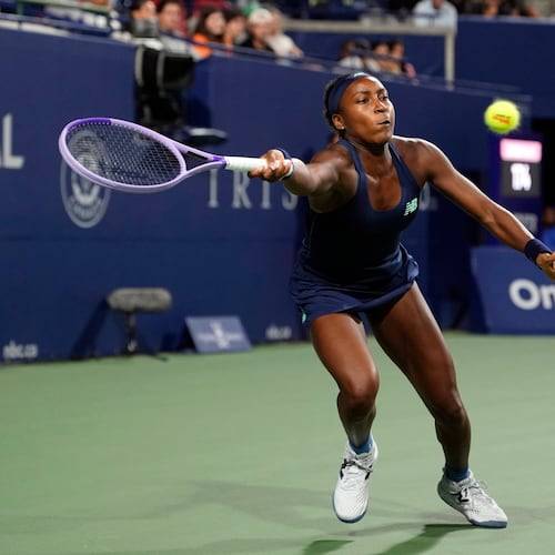 USA's Coco Gauff reaches for the ball against Kazakhstan's Elena Rybakina during a National Bank Open semi final tennis match in Toronto, Wednesday, August 12, 2026. (Chris Young/The Canadian Press via AP)