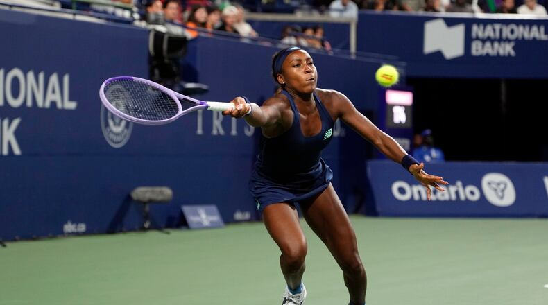 USA's Coco Gauff reaches for the ball against Kazakhstan's Elena Rybakina during a National Bank Open semi final tennis match in Toronto, Wednesday, August 12, 2026. (Chris Young/The Canadian Press via AP)