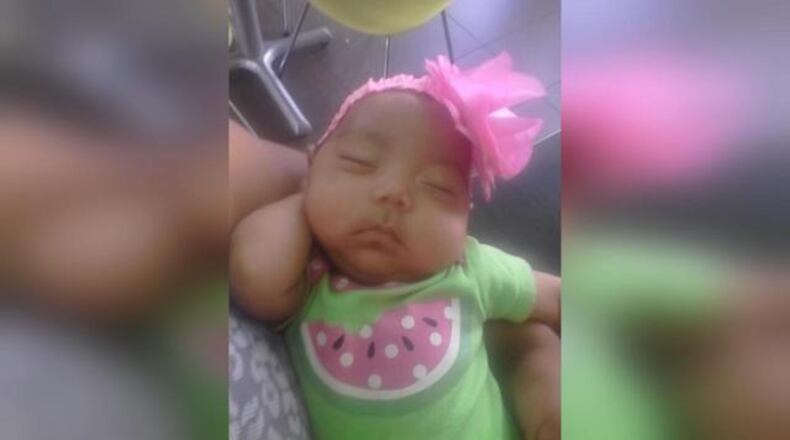 A 10-month-old was found with cigarette burns and an “intentionally removed” toenail, police said. (Credit: Channel 2 Action News)