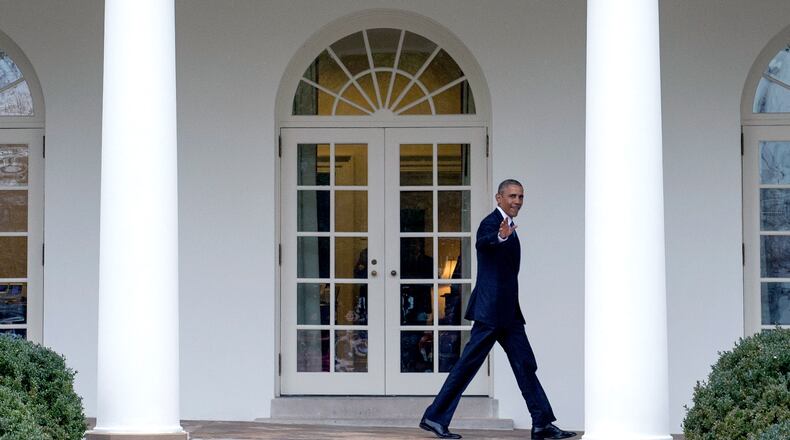 WASHINGTON, DC - JANUARY 20: U.S. President Barack Obama walks on the colonnade after leaving the Oval Office for the last time as President, in Washington, D.C. on January 20, 2017. (Photo by Kevin Dietsch-Pool/Getty Images)