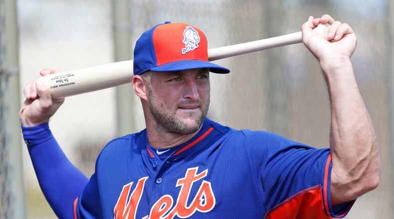 Former football star Tim Tebow had a rough debut in his first exhibition game with the New York Mets. He struck out twice, grounded into a double play and was hit by a pitch.AP Photo/Wilfredo Lee, File)