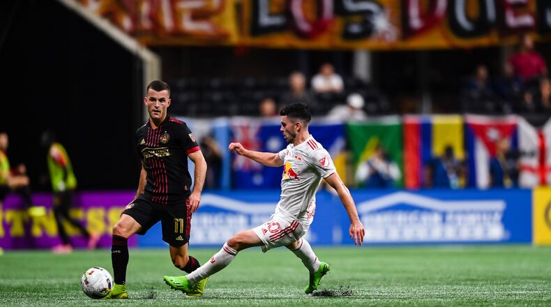 Atlanta United defender Brooks Lennon #11 dribbles the ball during the match against New York Red Bulls at Mercedes-Benz Stadium in Atlanta, United States on Wednesday August 17, 2022. (Photo by Mitchell Martin/Atlanta United)