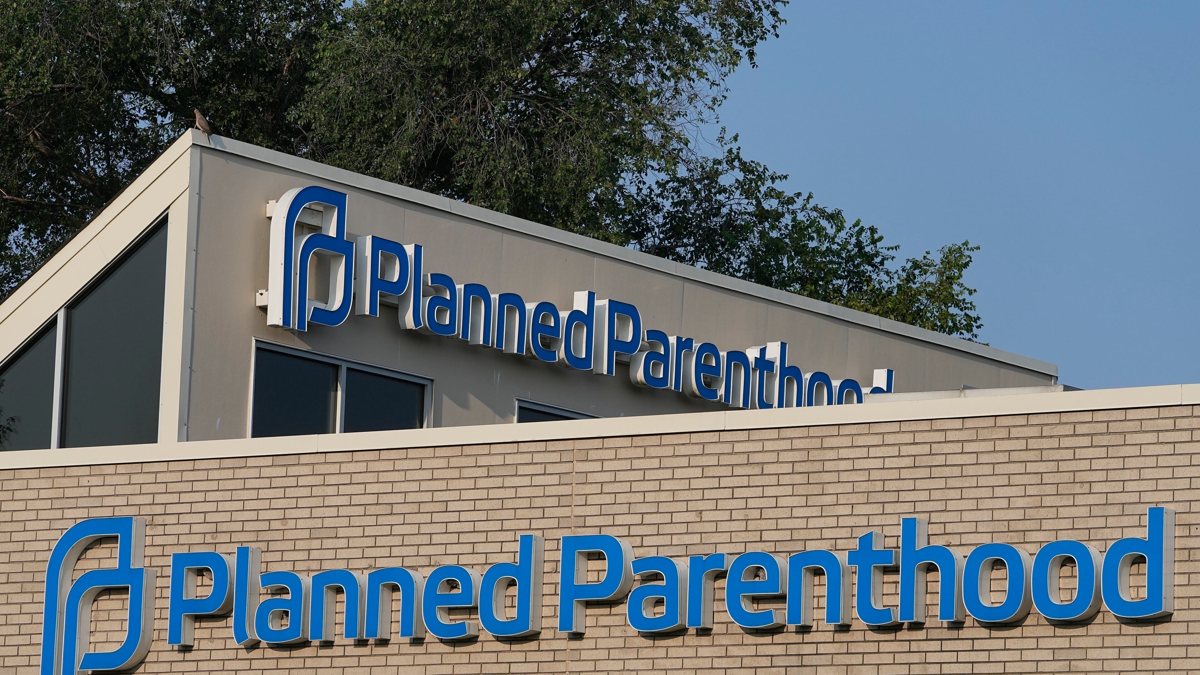 FILE - A Planned Parenthood sign is displayed on the outside of the clinic, Aug. 1, 2023, in Indianapolis. (AP Photo/Darron Cummings, File)