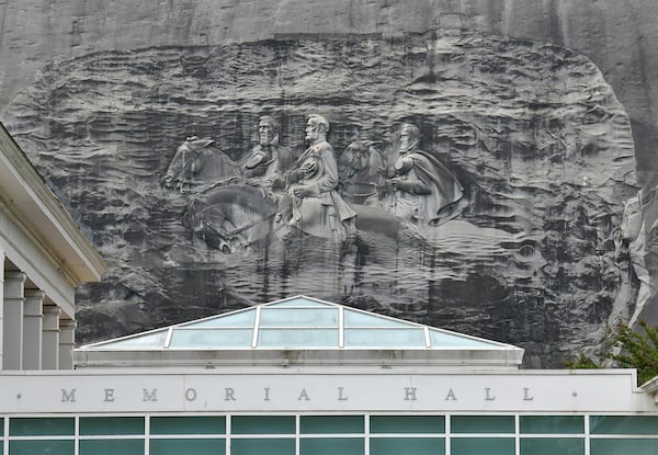 Memorial Hall (foreground) and the Confederate Memorial Carving (background) at Stone Mountain Park on Tuesday, April 20, 2021. (Hyosub Shin/AJC)