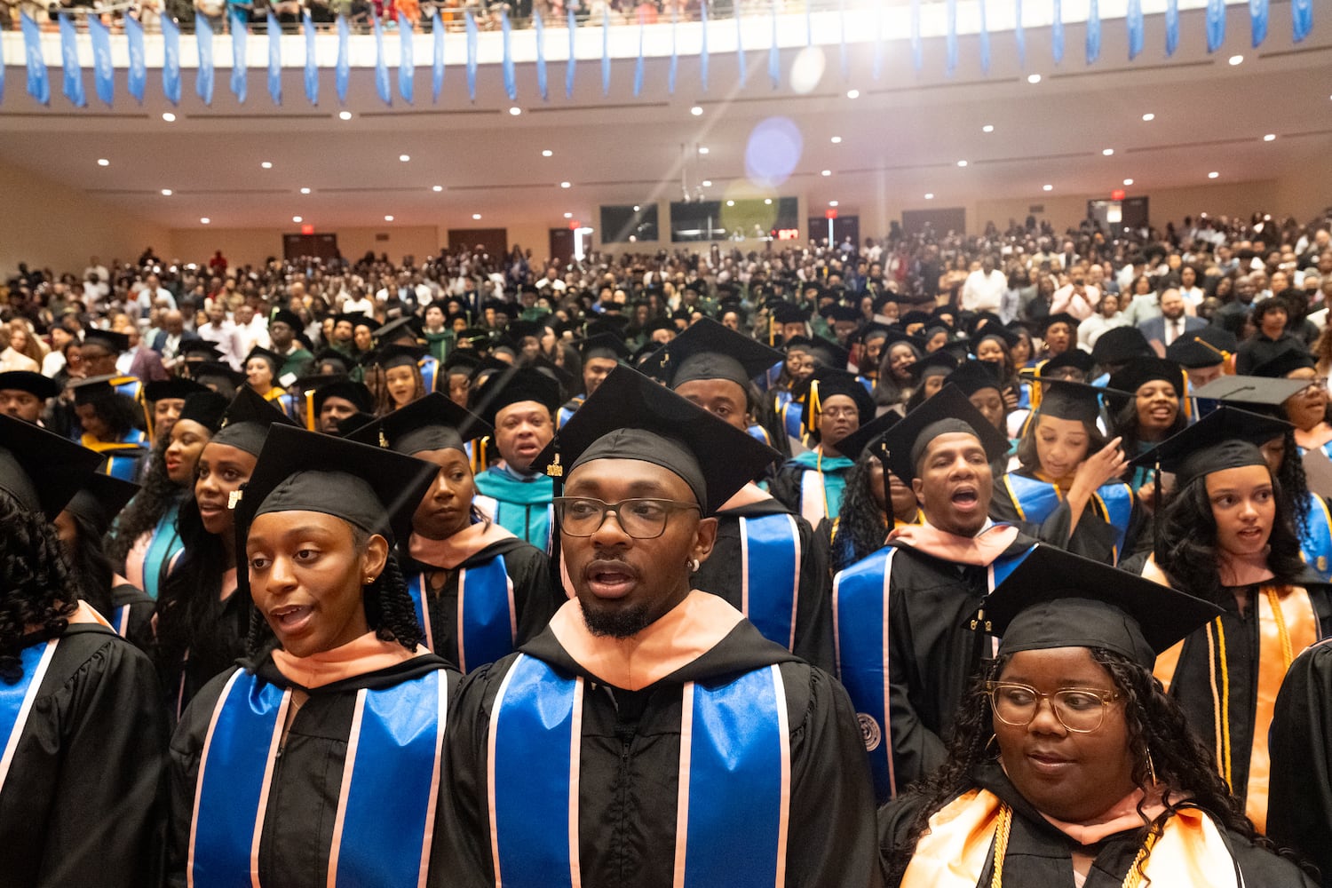 Students sing “Lift Every Voice and Sing” at the start of the graduation ceremony for Morehouse School of Medicine on Saturday, May 16, 2026, in Atlanta. (Ben Gray for the AJC)