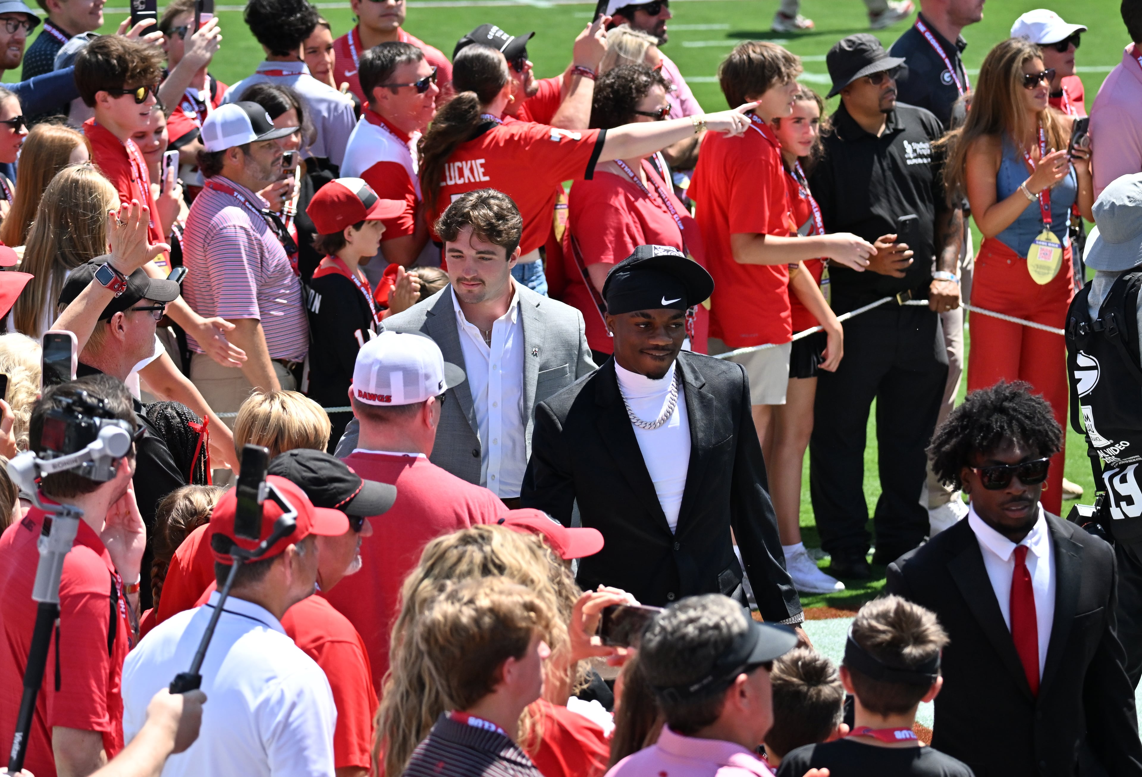 Georgia players are greeted by fans during Dawgs Walk before Georgia football's season opener and home opener against Marshall at Sanford Stadium, Saturday, August 30, 2025, in Athens. (Hyosub Shin / AJC)
