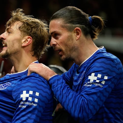 Everton's Kiernan Dewsbury-Hall, left, celebrates with Jack Grealish after scoring the opening goal during the English Premier League soccer match between Manchester United and Everton in Manchester, England, Monday, Nov. 24, 2025. (AP Photo/Dave Thompson)