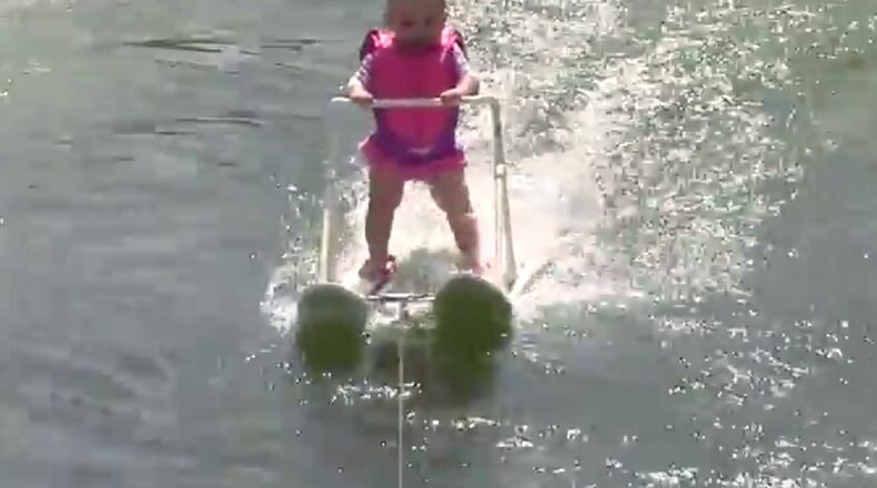 In this photo taken from a video made available by World Barefoot Center, 6-month-old Zyla St. Onge water-skis across Lake Silver in Winter Haven, Fla., on May 19, 2016.