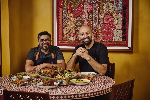 Chef Niven Patel (left) and Mo Alkassar, co-owners of FEAL Hospitality, the group behind Ghee Indian Kitchen. (Felipe Cuevas/Courtesy of Ghee Indian Kitchen)