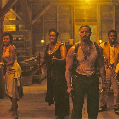 This image released by Warner Bros Pictures shows Michael B. Jordan, center, in a scene from "Sinners." (Warner Bros. Pictures via AP)