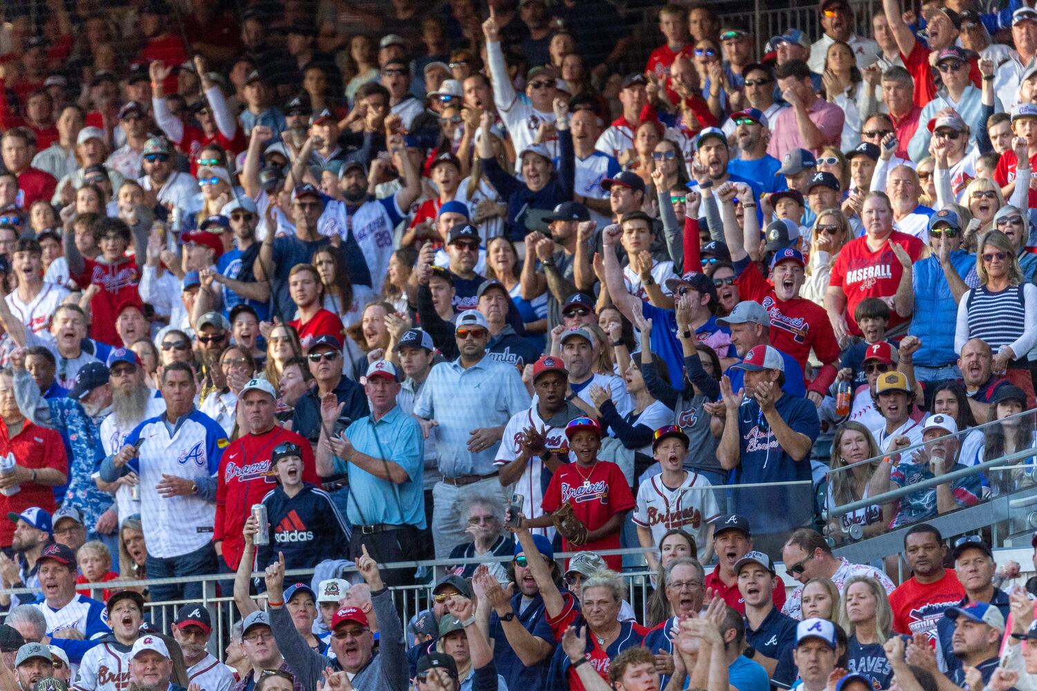 Fans cheer during the first inning of the NLDS Game 2 in Atlanta on Monday, Oct. 9, 2023.   (Miguel Martinez / Miguel.Martinezjimenez@ajc.com)