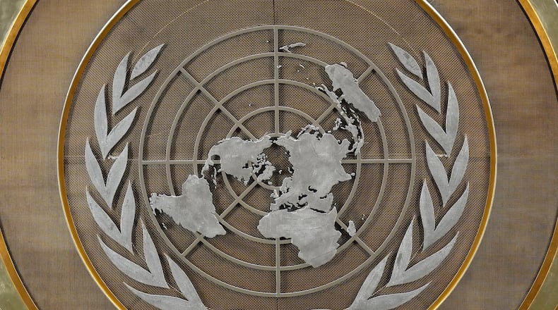 FILE - The United Nations logo is seen inside the 79th session of the United Nations General Assembly, Tuesday, Sept. 24, 2024. (AP Photo/Pamela Smith, File)