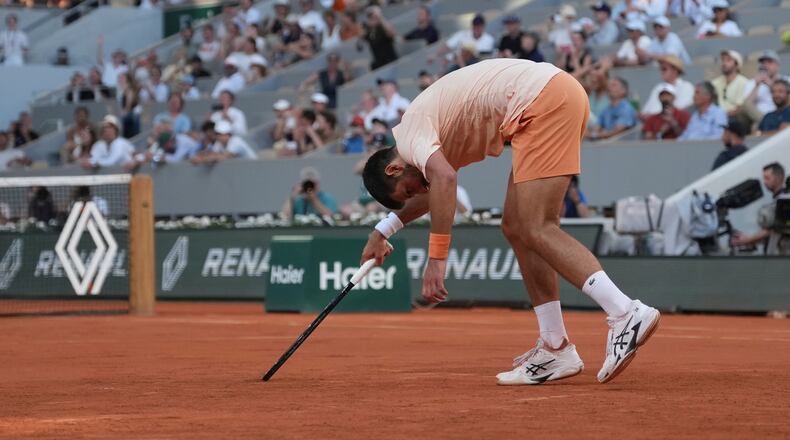 Novak Djokovic of Serbia celebrates after winning against Valentin Royer of France during their second round men's singles tennis match at the French Open tennis tournament in Paris, Wednesday, May 27, 2026. (AP Photo/Thibault Camus)