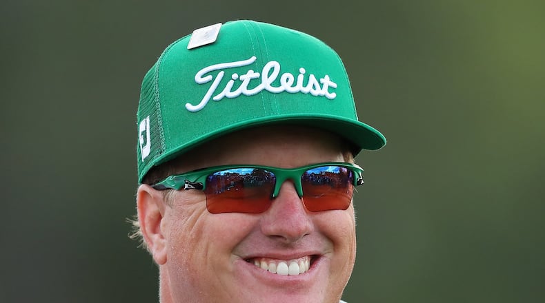 Walking off the 18th green with a four-shot, first-round Masters lead is ample reason to smile, as Charley Hoffman will attest. (Curtis Compton/ccompton@ajc.com)