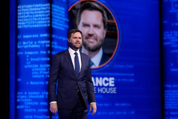 Vice President JD Vance walks on stage to speak at Bitcoin 2025, Wednesday, May 28, 2025, in Las Vegas. (AP Photo/John Locher)