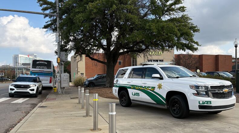 University of Alabama at Birmingham police attend to the scene of a stabbing Saturday, Nov. 22, 2025, at the campus Football Operations Center in Birmingham, Ala. (Diane Mwai/al.com via AP)