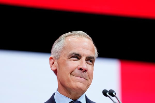Canadian Prime Minister Mark Carney speaks to supporters on stage at his campaign headquarters after the Liberal Party won the Canadian election in Ottawa, Ontario, Tuesday, April 29, 2025. (Justin Tang/The Canadian Press via AP)