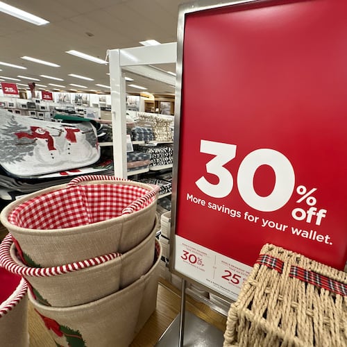 Sign shows discount available on seasonal items in a Kohl's department store, Monday, Dec. 8, 2025, in Castle Rock, Colo. (AP Photo/David Zalubowski)