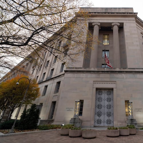 FILE - The U.S. Department of Justice building is seen in Washington, Saturday, Dec. 7, 2024. (AP Photo/Jose Luis Magana, File)