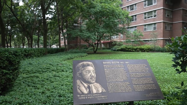 In this still image taken from video, a plaque honoring Bayard Rustin is pictured outside of partner Walter Naegle's home on Saturday, June 28, 2025, in New York. (AP Photo/Mary Conlon)