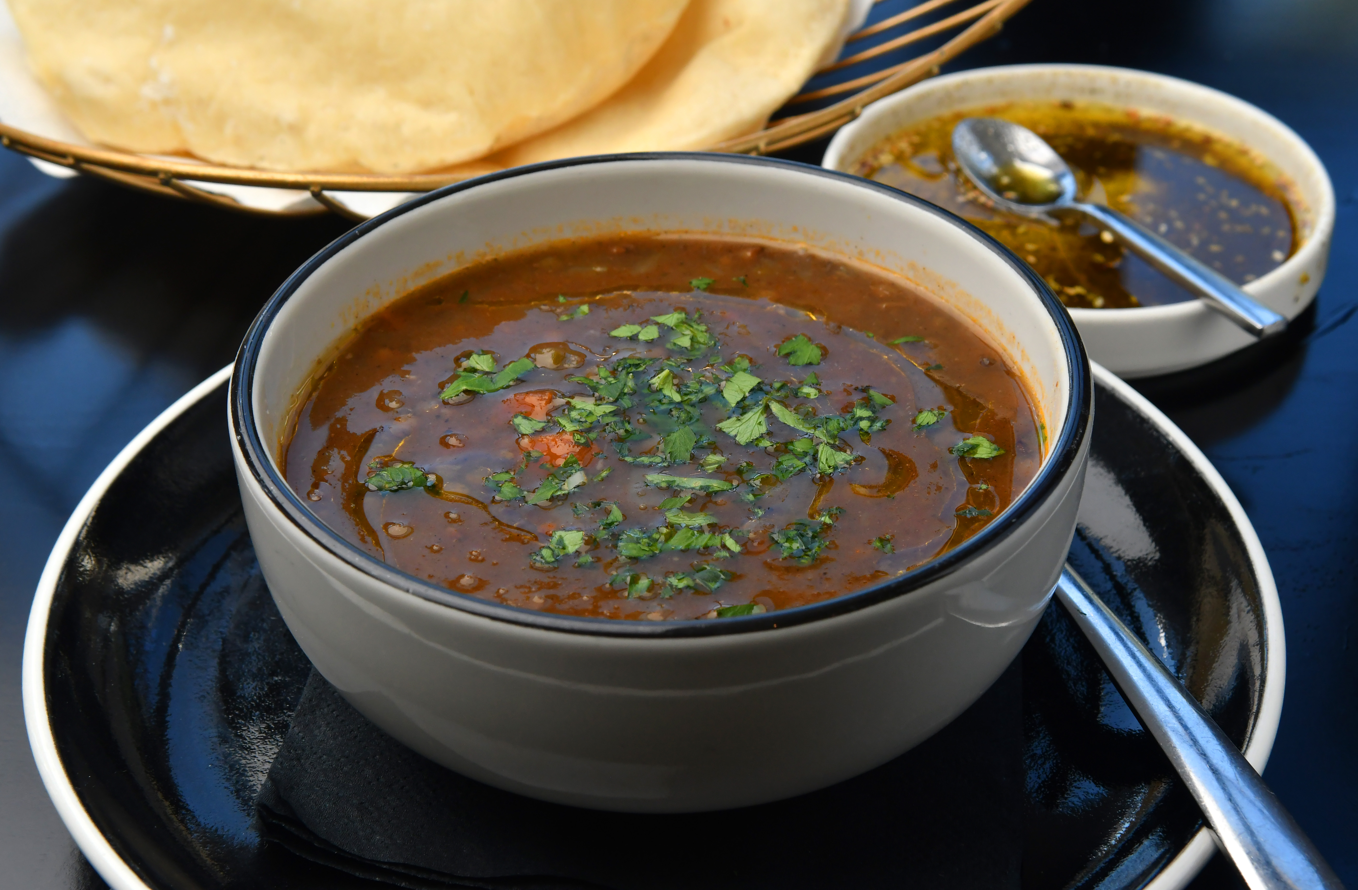 Lentil Soup (served with house-made pita and olive oil with za’atar), from Zakia in Buckhead. (CHRIS HUNT FOR THE ATLANTA JOURNAL-CONSTITUTION)