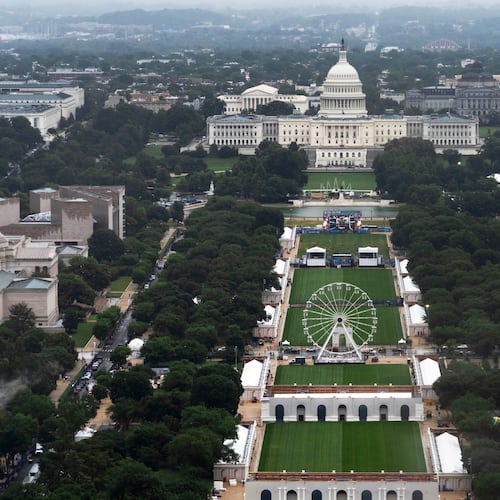 A Ferris wheel is seen on the National Mall for the 250 Anniversary celebration, Tuesday, June 23, 2026, in Washington. (AP Photo/Manuel Balce Ceneta)