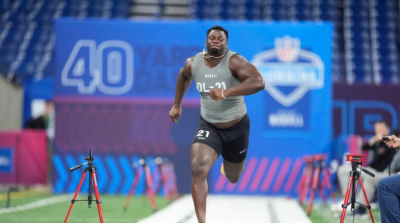 Clemson defensive lineman Ruke Orhorhoro runs the 40-yard dash at the NFL football scouting combine, Thursday, Feb. 29, 2024, in Indianapolis. (AP Photo/Michael Conroy)