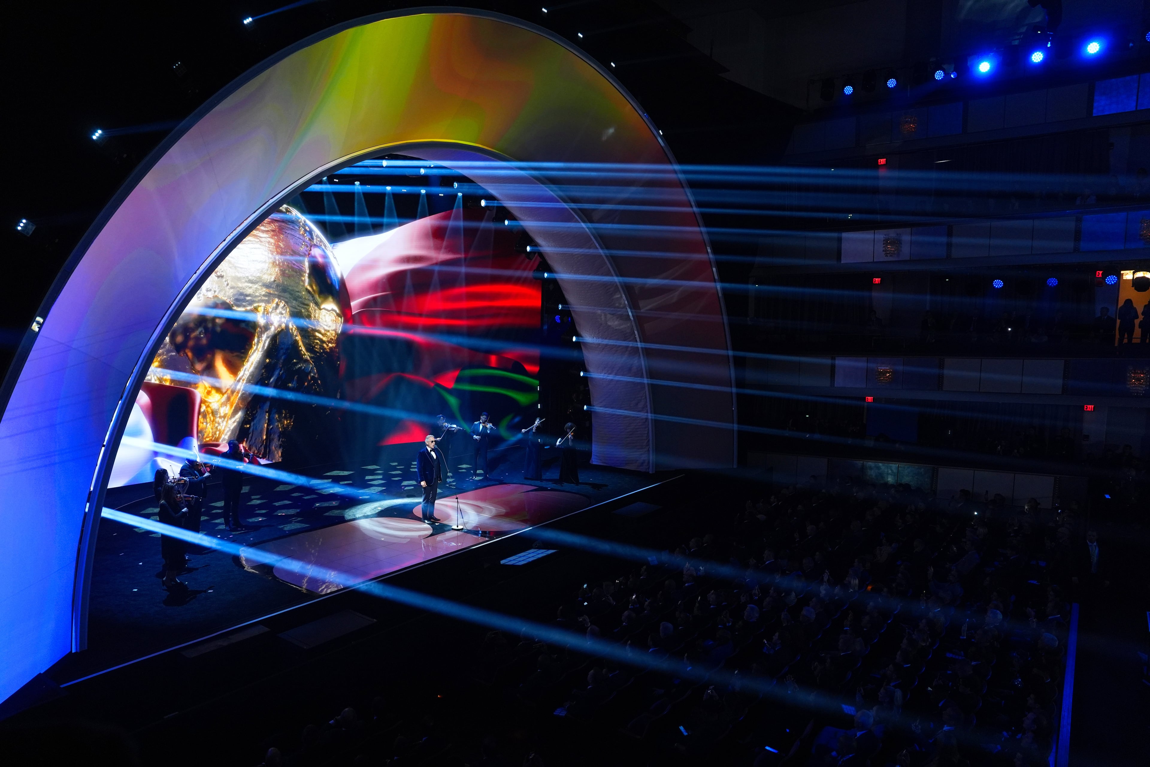 Singer Andrea Bocelli performs at the draw for the 2026 soccer World Cup at the Kennedy Center in Washington, Friday, Dec. 5, 2025. (AP Photo/Evan Vucci)