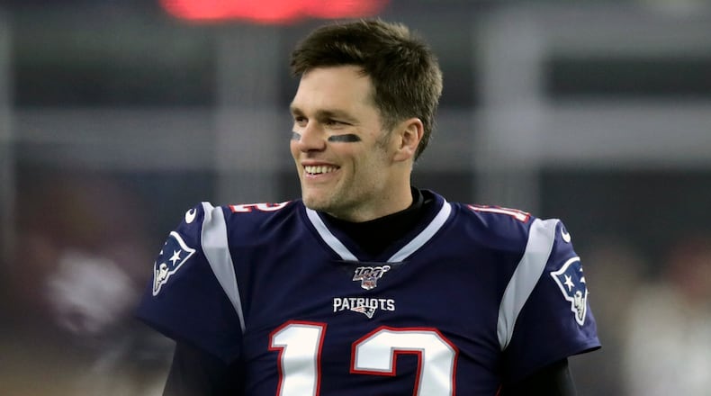 Darn Tom Brady's youthful looks - here evidenced before a New England playoff game in January. But surely the calendar doesn't lie. (AP Photo/Charles Krupa)