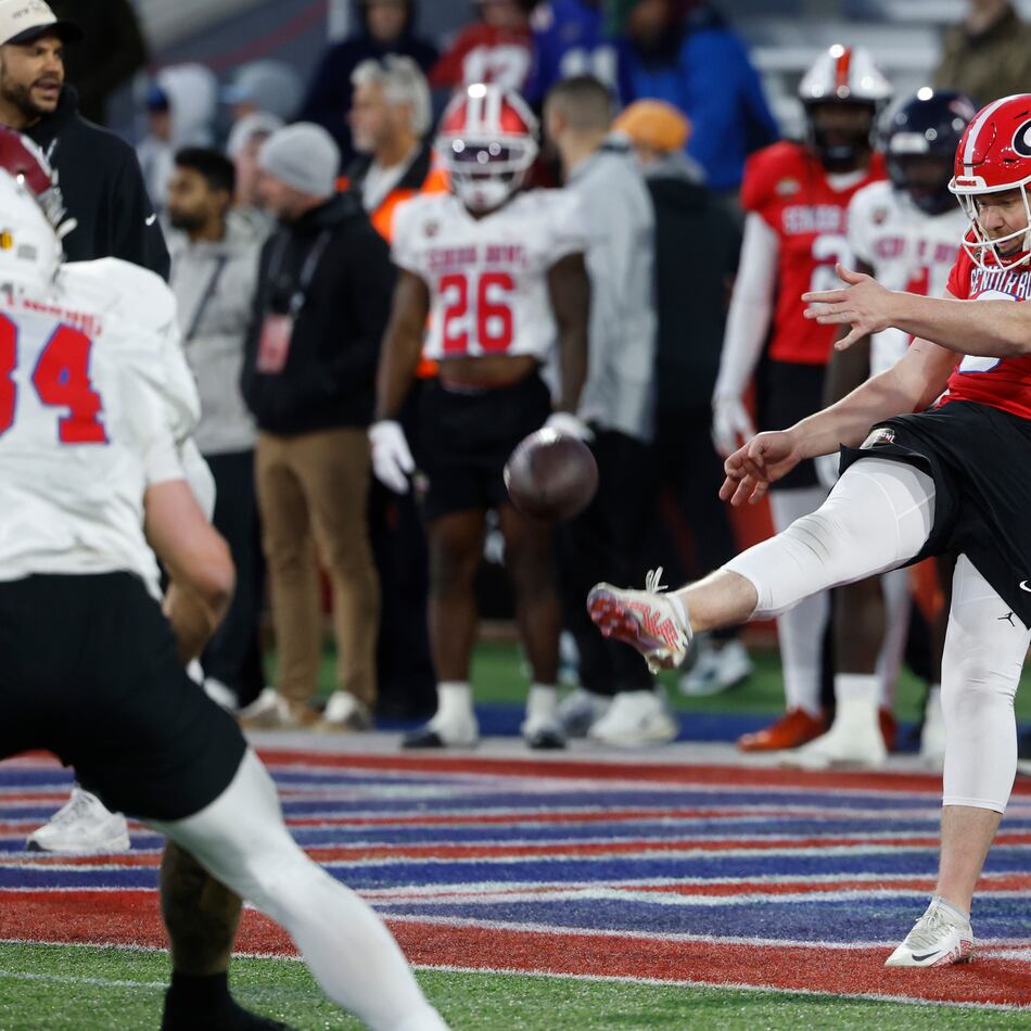 American Team punter Brett Thorson (6), of Georgia, runs through drills during practice for the Senior Bowl NCAA college football game Tuesday, Jan. 27, 2026, in Mobile, Ala. (AP Photo/Butch Dill)