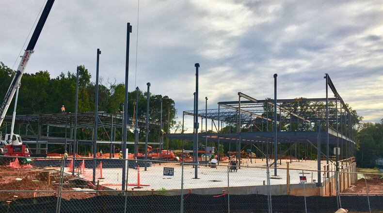 The new Decatur 3-5 school at Talley Street. In several weeks since this photo was taken the building outline is fuller with more definition, with the facility scheduled to open on time next August. Bill Banks file photo for the AJC