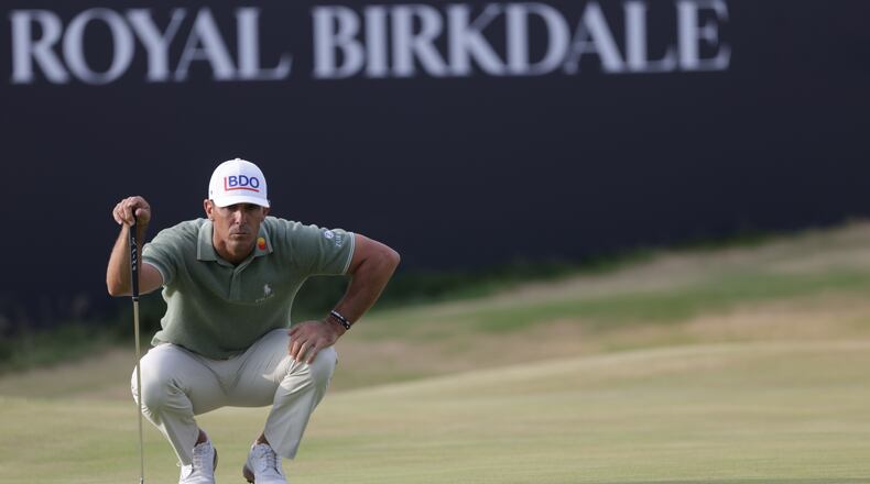 FILE - Billy Horschel of the United States looks at the lie of his putt on the 18th green during the first day of the British Open Golf championships at Royal Birkdale golf club, in Southport, England, Thursday, July 16, 2026. (AP Photo/Peter Morrison, File)